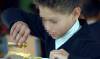 Facua critica que el desayuno por el 28F en los colegios los dará a una empresa multada por alimentos en mal estado