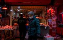 China lucha por frenar al virus un año después del histórico cierre de Wuhan