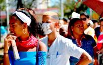 Cubanos en la calle durante la pandemia. / EFE