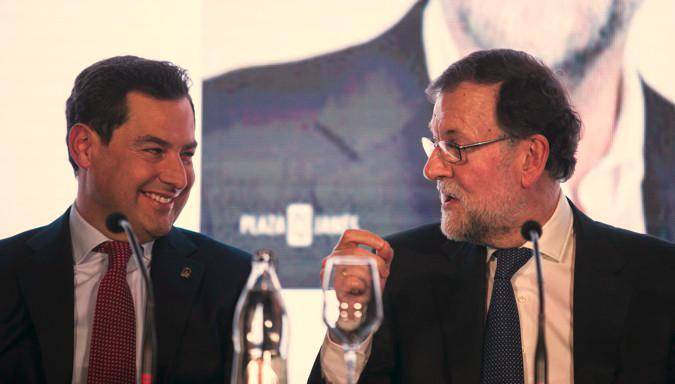 Rajoy reivindica en Sevilla el centrismo del PP y ensalza la figura de Moreno