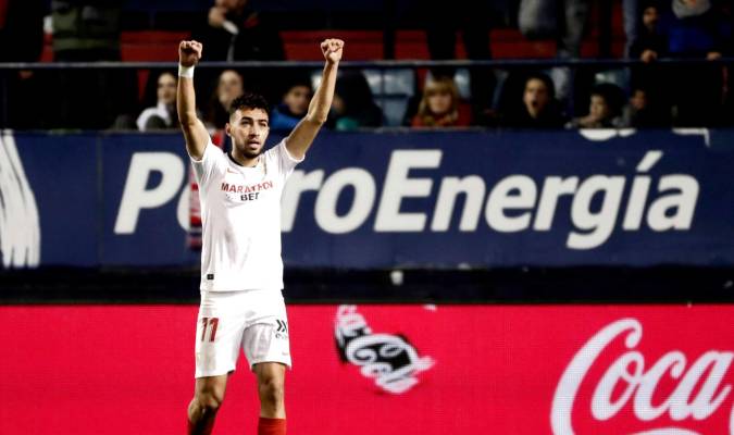 El delantero del Sevilla Munir El Haddadi celebra tras marcar ante Osasuna. EFE/Jesús Diges