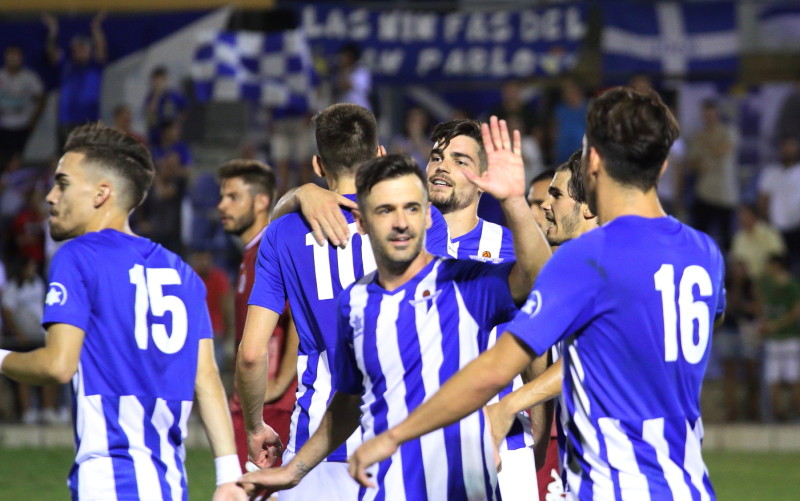 Los jugadores del Écija Balompié celebran un gol ante el Badajoz. / Ecijafotosport